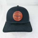 Mornings Are For Coffee And Contemplation Leather Patch, black baseball cap with brown leather patch featuring this phrase embroidered on front.