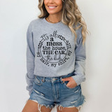 It's All A Mess BLACK DTF Heat Transfer, a humorous graphic design on a women's gray sweatshirt featuring the phrase 'It's all a mess, the house, THE CAR, the kids, my hair, my shirt' in black text.