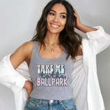 Take Me To The Ballpark DTF Heat Transfer, a colorful and playful design on a gray tank top worn by a smiling woman.