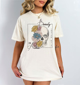 Beauty In Ashes Screen Print Heat Transfer, T-shirt design featuring a detailed skull with colorful floral accents and inspirational text.