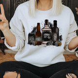 Racing Drinks DTF Heat Transfer, illustrated design of bottles and cans with racing checkered flag motifs for apparel decoration.