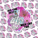 All The Petty Girls Walk Like This Sticker Sheet, vibrant sticker design featuring a skeletal hand making a peace sign with pink flowers and a purple background, with bold black and white text.