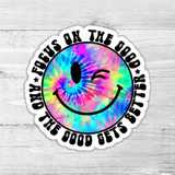 Focus On The Good And The Good Gets Better Die Cut Sticker, vibrant tie-dye smiley face with one eye winking and surrounding motivational quote.
