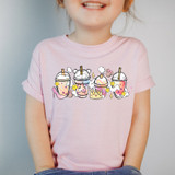 Princess Drinks DTF Heat Transfer, colorful cup design with crown, stars, and clouds on a child's pink T-shirt.