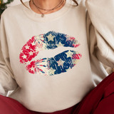USA Star Lips DTF Heat Transfer, image of a sweatshirt with a colorful star and fireworks design in a lips shape printed on the front.