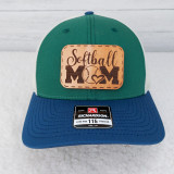 Softball Mom Leather Hat Patch, green and blue baseball cap with embroidered leather patch saying 'Softball Mom' with a heart and baseball design.