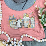 Sunflower Latte Screen Print Heat Transfer, designed with colorful illustrations of sunflower-themed coffee cups and drinks on a pink fabric background.
