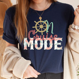 On Cruise Mode DTF Heat Transfer, colorful and festive holiday-themed design on a navy blue T-shirt.