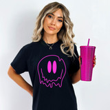 Melting Face PINK DTF Heat Transfer, pink melting face design on a woman's black t-shirt.