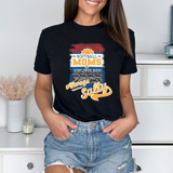 Softball Moms Always Salty DTF Heat Transfer, a woman wearing a black T-shirt with a colorful and sporty softball-themed design.
