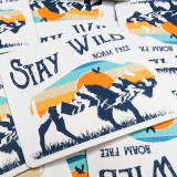 Stay Wild Roam Free Embroidered Patch, colorful outdoor nature scene with mountain and sunset design.