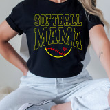 Softball Mama Ball DTF Heat Transfer, a black T-shirt with yellow and red design featuring the text 'Softball Mama' and a heart inside a curved line resembling a softball.