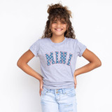Mini Stars DTF Heat Transfer, close-up of a girl wearing a grey t-shirt with starred Mini logo design in vibrant colors.