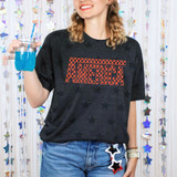 America Checkered DTF Heat Transfer, woman holding a blue drink and wearing a black T-shirt with the word America in checkered pattern, decorative stars on the background.