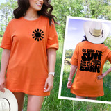 Sun BLACK DTF Heat Transfer, orange t-shirt with black sun logo on front and quote design on back.