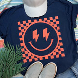 Checkered Happy Face CORAL PUFF Screen Print Heat Transfer, on a navy t-shirt with smiling face design and lightning bolt eyes.