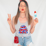 America Vibes Tie Dye DTF Heat Transfer, colorful tie dye smiley face with peace sign, patriotic American flag colors, bold red, white, blue design for clothing decoration.