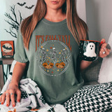 It's Fall Ya'll DTF Heat Transfer, Halloween-themed design with dancing skeletons and pumpkins on a woman holding a mug.
