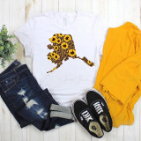 Alaska Leopard Sunflower Sublimation Transfer, white T-shirt with a leopard print silhouette filled with sunflower patterns.