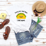 Every Now and Then I Fall Apart Taco Sublimation Transfer, white T-shirt with a taco illustration and sad face, placed on denim shorts with summer accessories on a wooden background.
