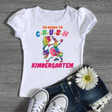 Back To School Dabbing Unicorns Kindergarten Sublimation Transfer, a white T-shirt with a colorful dabbing unicorn graphic and the text 'I'm ready to crush kindergarten' in vibrant colors.