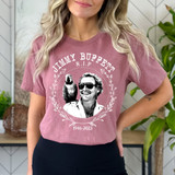 JB Parrot DTF Heat Transfer, a custom designed t-shirt commemorating Jimmy Buffett with a portrait and symbolic elements.