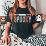 Let's Get Spooky Pumpkin/Bats DTF Heat Transfer, Halloween-themed design on black T-shirt featuring colorful pumpkins, bats, and spooky text.