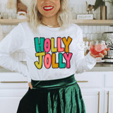 Holly Jolly DTF Heat Transfer, colorful holiday-themed apparel design on a woman's white shirt.