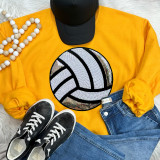 Sequins Volleyball Patch Chenille Patch, a round patch with black and white sequins depicting a volleyball, displayed on a yellow sweatshirt with casual clothing accessories.