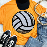 Sequin Volleyball Patch Chenille Patch, colorful embroidered volleyball patch with sequins on orange T-shirt styled with jeans, sneakers, beaded necklace, and cap.