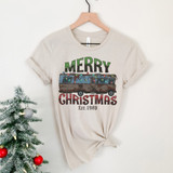 Merry Christmas RV DTF Heat Transfer, Christmas themed t-shirt with a vintage van decorated with holiday lights and Christmas text.