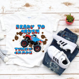 Back To School Monster Truck Crush The Third Grade, sublimation transfer design on a white T-shirt with a monster truck graphic and colorful text. 