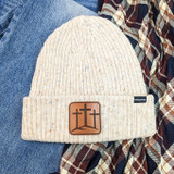 Triple Cross Leather Hat Patch, beige knitted beanie hat with leather patch featuring three crosses symbol.