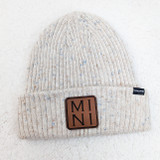 MINI Square Leather Patch, beige speckled knitted beanie hat with a brown leather patch featuring 'MINI' in black lettering.
