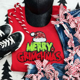 Merry Gmas Chenille Patch, Christmas themed embroidered patch with Santa hat and holiday lettering on a red shirt.