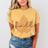 Fall Leaf DTF Heat Transfer, yellow t-shirt with fall-themed word art and the word 'Fall' written in cursive.