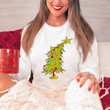 Little Tree DTF Heat Transfer, colorful Christmas tree design with ornaments and star on a woman's white sweater.