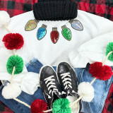 Sequin Bulb Patches, colorful sequin bulbs as decorative patches on a white sweatshirt.