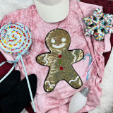 Sequin Gingerbread Man Patch, glittery gingerbread man patch decorated with multicolored sequins and red, green buttons on pink velvet background