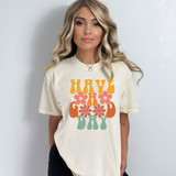Have A Good Day Retro DTF Heat Transfer, colorful vintage style graphic design on a woman's t-shirt featuring the phrase 'Have A Good Day' with retro floral and bubble lettering.
