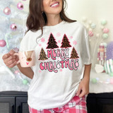 Merry Christmas Pink Leopard Trees DTF Heat Transfer, Christmas-themed pink and leopard print trees with snowflakes and 'Merry Christmas' text on a white t-shirt.
