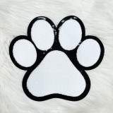 Dog Paw White Chenille Patch, embroidered white pet paw print patch with black border on a white furry background.
