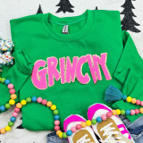 PINK Grinchy Chenille Patch, a bright pink felt patch with glitter and embroidered details of the Grinch character from the holiday story.