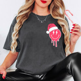 Santa Hat Happy Face DTF Heat Transfer, pink dripping smiley face with a Santa hat and Christmas candy cane in hand.