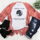 Full Moon Feelin' Cute May Make Everyone Crazy Later, IDK Sublimation Transfer T-Shirt with moon graphic and humorous text, styled with pink lace cardigan, distressed jeans, and black boots.
