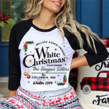 White Christmas DTF Heat Transfer, a woman wearing a festive holiday-themed shirt with Christmas decorations and text graphic for holiday celebrations.