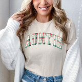 Auntie Plaid DTF Heat Transfer, colorful plaid pattern uploaded on a white T-shirt worn by a smiling woman.