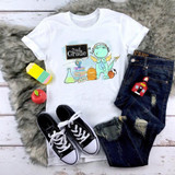 Back To School Dragon Blue Second Grade Sublimation Transfer, a children's T-shirt with a cute dragon wearing headphones and surrounded by school-related items.
