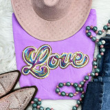 RAINBOW LOVE Sequin Patch, colorful embroidered patch with the word 'Love' in rainbow colors on a purple t-shirt surrounded by accessories.