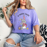So Hoppin' Boujee DTF Heat Transfer, graphic design of a cute bunny holding a basket of Easter eggs on a woman's purple T-shirt